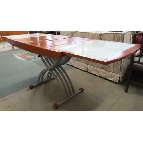 108 - A modern stained teak and glass topped metamorphic dining/coffee table with tambour extending top, 8... 