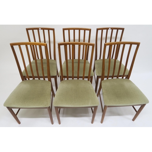 109 - A set of six mid 20th century teak McIntosh railback dining chairs with upholstered seats, 91cm high... 