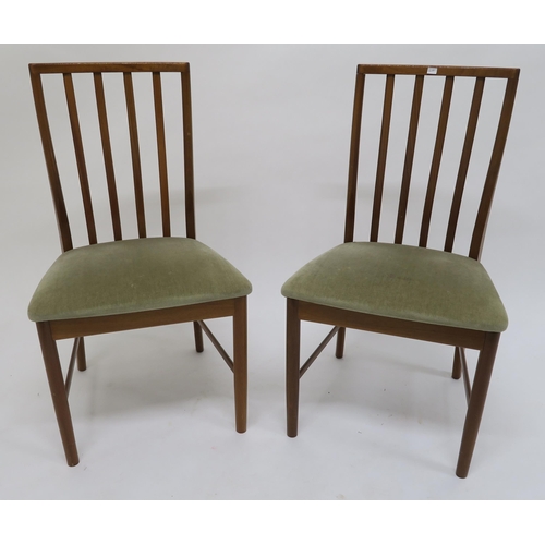 109 - A set of six mid 20th century teak McIntosh railback dining chairs with upholstered seats, 91cm high... 