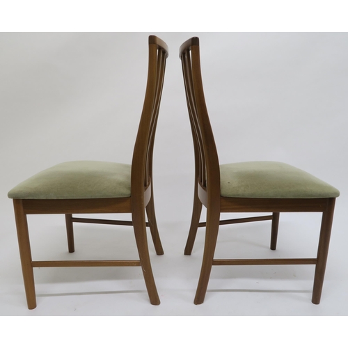 109 - A set of six mid 20th century teak McIntosh railback dining chairs with upholstered seats, 91cm high... 