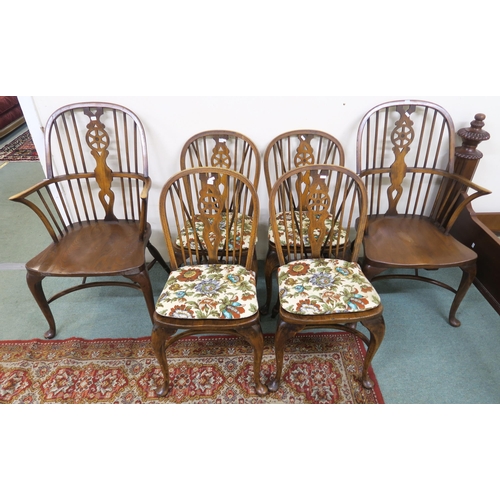 121 - A 20th century elm set of six Windsor chairs comprising two armchairs and four regular (6)