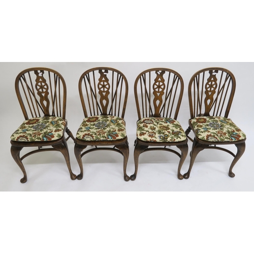 121 - A 20th century elm set of six Windsor chairs comprising two armchairs and four regular (6)