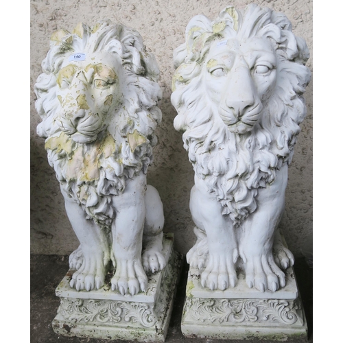 140 - A pair of contemporary stone ware garden lions, 79cm high (2)