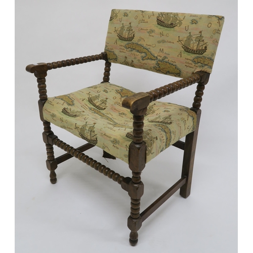 18 - A Victorian beech framed bobbin turned armchair with tapestry upholstery