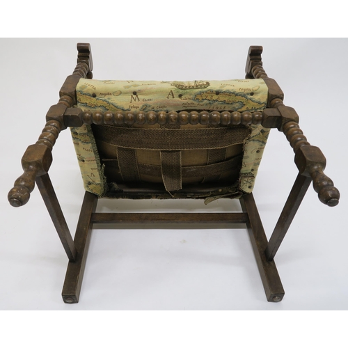 18 - A Victorian beech framed bobbin turned armchair with tapestry upholstery