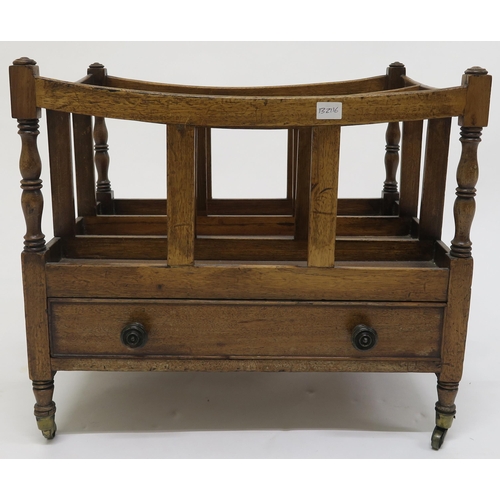 21 - A Victorian mahogany Canterbury with single drawer on brass casters, 41cm high x 46cm wide x 37cm de... 