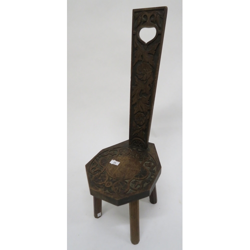 29 - A Victorian carved oak spinning chair, 83cm high