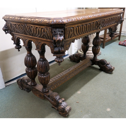 60 - A 19th century continental oak single drawer centre table with extensive carvings throughout, 76cm h... 