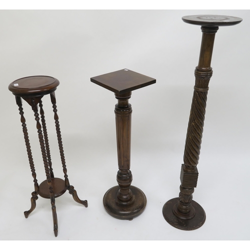 63 - A lot of three assorted 20th century mahogany torchiere/plantstands (3)