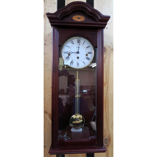 70 - A modern mahogany cased wall clock