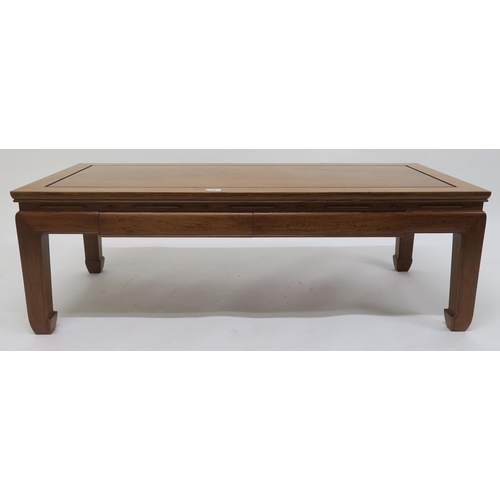 79 - A contemporary hardwood oriental style two drawer coffee table, 40cm high x 122cm wide x 51cm deep