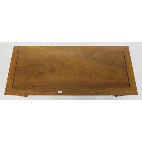 79 - A contemporary hardwood oriental style two drawer coffee table, 40cm high x 122cm wide x 51cm deep