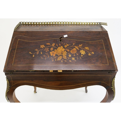 8 - A Victorian rosewood and marquetry inlaid continental writing bureau with a pierced brass gallery to... 