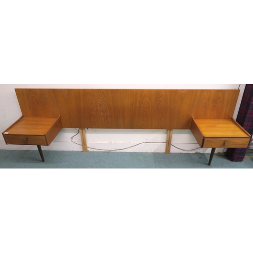 87 - A mid 20th century teak G Plan headboard with flanking single drawer bedside table, 84cm high x 244c... 