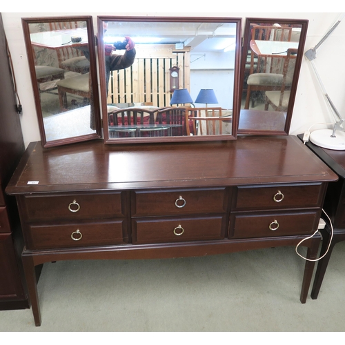 95 - A 20th century Stag triple mirror back dressing table, 138cm high x 131cm wide x 50cm deep