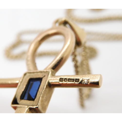 532 - A 9ct gold sapphire set ankh pendant length 5cm x 2.3cm, with 9ct chain, length 46cm, weight togethe... 