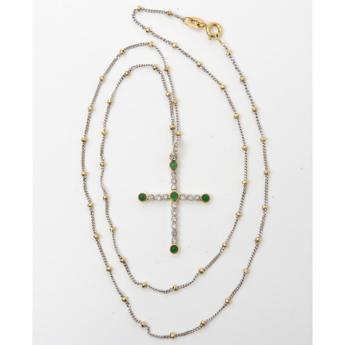 534 - An Italian made bi colour 18ct gold ball chain, length 50cm with a emerald and diamond cross, 3.4cm ... 