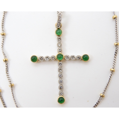 534 - An Italian made bi colour 18ct gold ball chain, length 50cm with a emerald and diamond cross, 3.4cm ... 