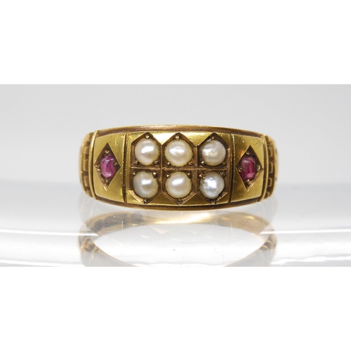 559 - A 15ct gold pearl and ruby ring, hallmarked Chester 1886, finger size N, weight 2.8gms