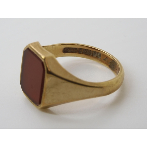 564 - A 9ct gold carnelian signet ring, size U1/2, weight 5.9gms