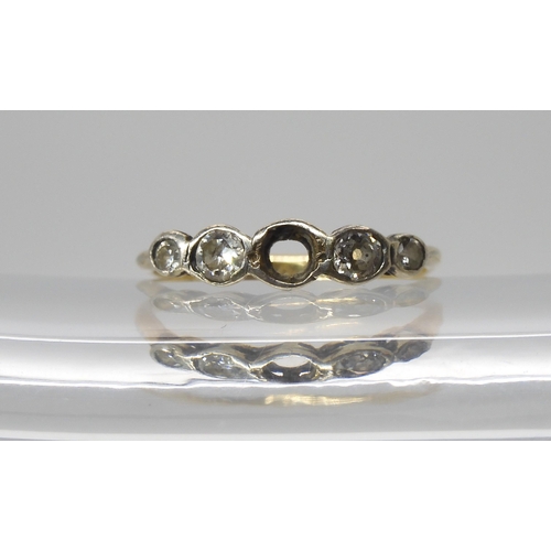 566 - An 18ct gold diamond ring (one diamond missing) the four remaining diamonds have an estimated diamon... 