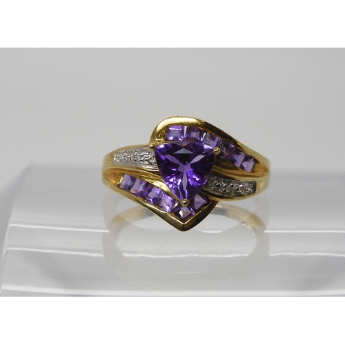 568 - A 9ct gold amethyst and diamond accent dress ring, size N1/2, weight 3.2gms