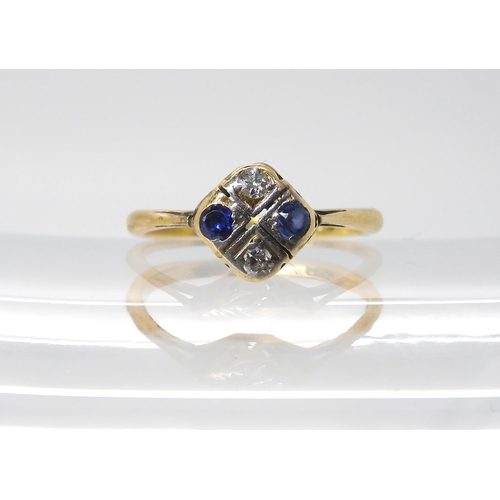 573 - An 18ct gold diamond and blue gem set vintage ring, size K, weight 2.1gms