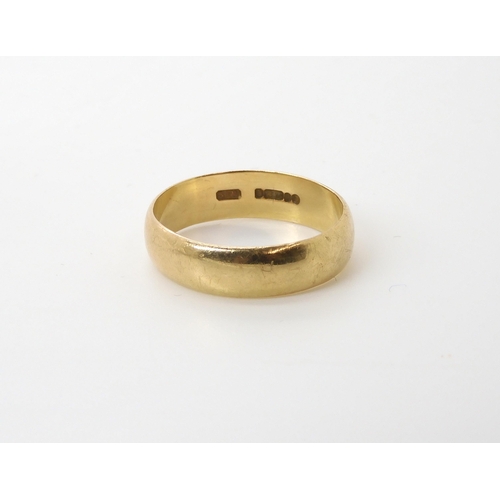 576 - A 9ct gold wedding ring size W1/2, weight 4.5gms