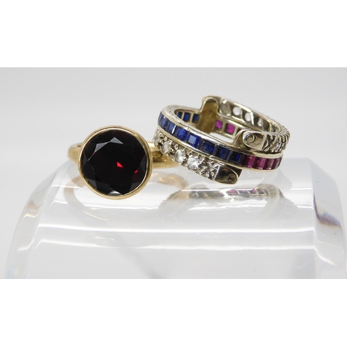 577 - A 9ct white gold clear, red and blue gem day and night ring, and a 9ct red gem set ring, weight toge... 