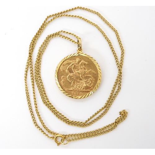 582 - A 1912 gold full sovereign in a 9ct pendant mount with yellow metal chain, weight combined 12.7gms