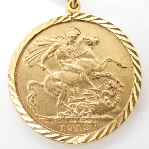 582 - A 1912 gold full sovereign in a 9ct pendant mount with yellow metal chain, weight combined 12.7gms