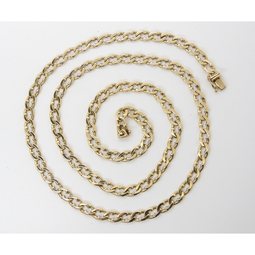 583 - A 9ct fancy curb chain necklace with full British import marks, length 61cm, weight 22.1gms