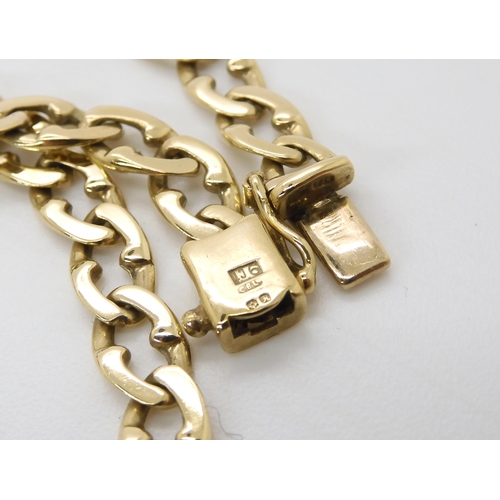 583 - A 9ct fancy curb chain necklace with full British import marks, length 61cm, weight 22.1gms