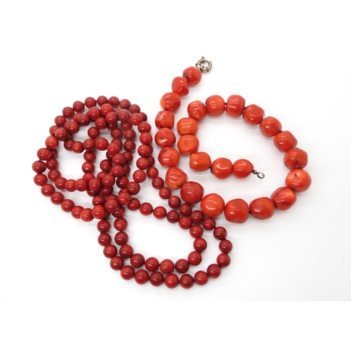 584 - Two coral necklaces, the large beads, approx 18mm diameter each bead, length 48.5cm, round beads app... 