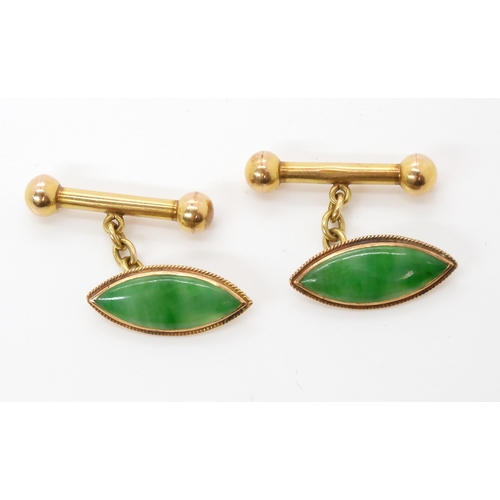 590 - A pair of Chinese green hardstone cufflinks, stamped '18' and Chinese characters, weight 6.2gms ... 