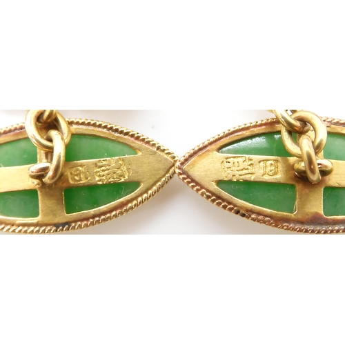 590 - A pair of Chinese green hardstone cufflinks, stamped '18' and Chinese characters, weight 6.2gms ... 