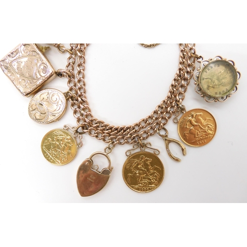 592 - A 9ct gold charm bracelet made from a tapered fob chain, hung with a 1898 gold full sovereign, a 190... 