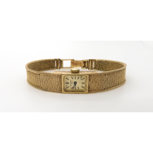 593 - A 9ct gold ladies Rotary watch, hallmarked London 1970, weight without the mechanism 20.1gms