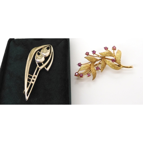 595 - A 9ct gold and ruby flower brooch weight 6.2gms, together with a silver Ola Gorie brooch