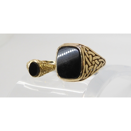 603 - A 9ct gold gents onyx ring with knotwork shoulders, size Z, and a smaller example size O1/2, weight ... 