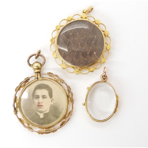 612 - A 9ct gold pearl set mourning locket with hand coloured photo and hair panel under glazed panel, tog... 