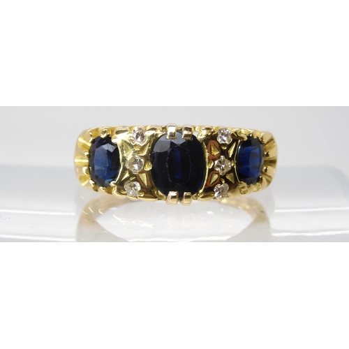 613 - An 18ct gold sapphire and diamond ring, size Q, weight 6.4gms