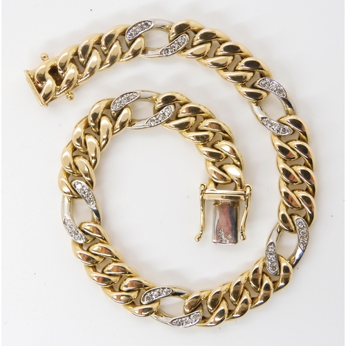 616 - A 14k gold curb chain bracelet with diamond set links, set with estimated approx 0.36cts of eight cu... 