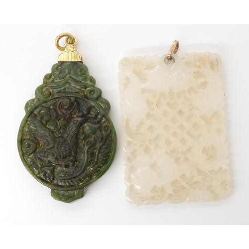 619 - Two Chinese hardstone carved pendants with yellow metal mounts