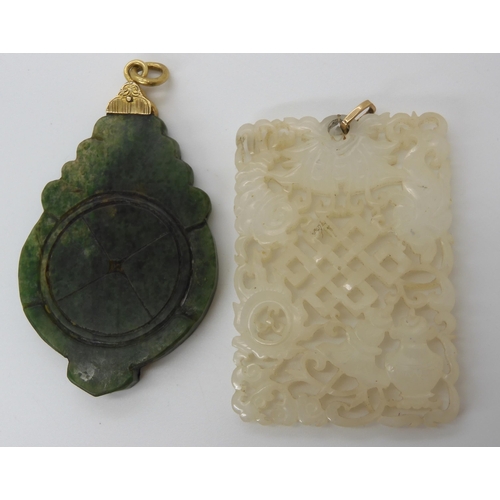 619 - Two Chinese hardstone carved pendants with yellow metal mounts