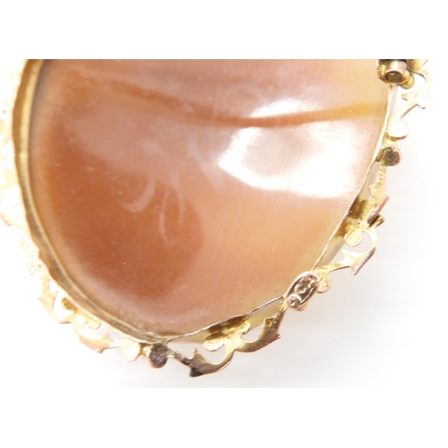 620 - A 9ct mounted large shell cameo, dimensions in mount 5.6cm x 4.5cm, weight 13.1gms