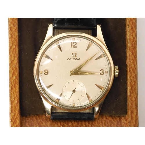 621 - A 9ct gold gents Omega wristwatch with black leather generic strap. Hallmarked Birmingham 1953, diam... 