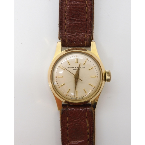 623 - A gold plated Baume & Mercier ladies watch with brown leather strap