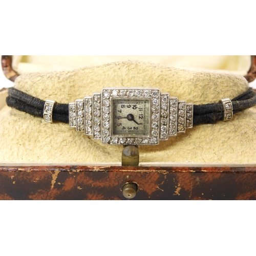 624 - A platinum and diamond ladies Art Deco cocktail watch, the case stamped platinum Vertex set with est... 