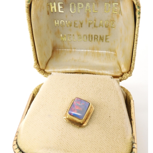 626 - A 9ct gold opal doublet tie stud 1.2gms without fastener, in original box from Australia